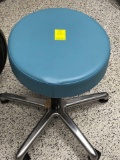 Blue rolling medical stool