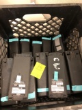 Black crate full of Motorola batteries