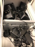 Small gray file cabinet full of Motorola portable radios , chargers & microphones( cabinet included)