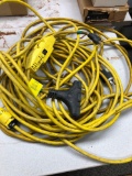 2- yellow extension cords and GFI