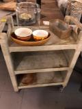 Rubbermaid three shelf kitchen cart with miscellaneous pan and bowls