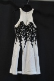 Faviana White and Black Sleeveless Mini Dress with Pockets Size: 4