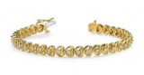 14K YELLOW GOLD .90 CTW G-H I1/I2 FLOATING DIAMOND HEART BRACELET