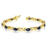 Oval Sapphire and Diamond XOXO Link Bracelet 14k Yellow Gold 7.00ctw