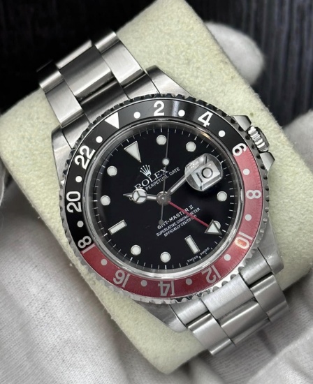 Rolex GMT MASTER II Coke on Oystersteel Comes with Box & Papers