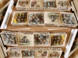 12 SMALL BOXES OF MARKED MARBLES