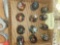 Tray of 12 Art glass marbles with Emb bases