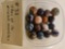 Tray of 16 marbles