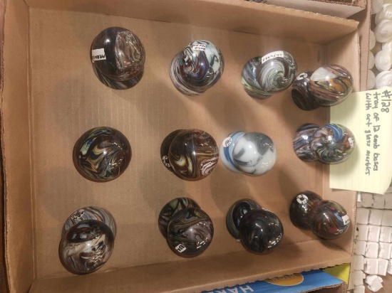 Tray of 12 Art glass marbles with Emb bases