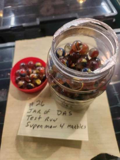 Jar of D.A.S Test Run Super MAn 4 marbles