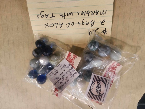 2 bags of Alox marbles with retail tags