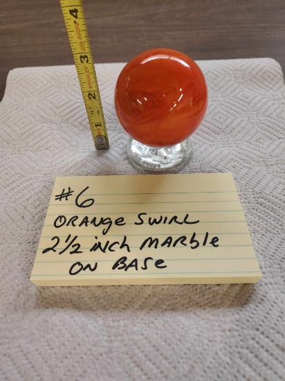 2 1/2 inch Orange Swirl marble on base