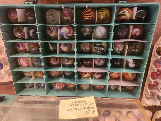 Display case with 48 Art Glass marbles