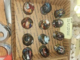 Tray of 12 Art glass marbles with Emb bases