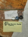 Found in Pack American toy co 5 pieces marbles and jugs