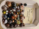 Tray of mixed marbles