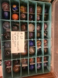 Display case with 48 Art Glass marbles