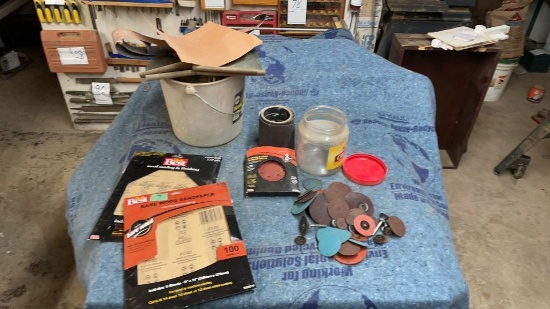 Lot of sand paper with bucket
