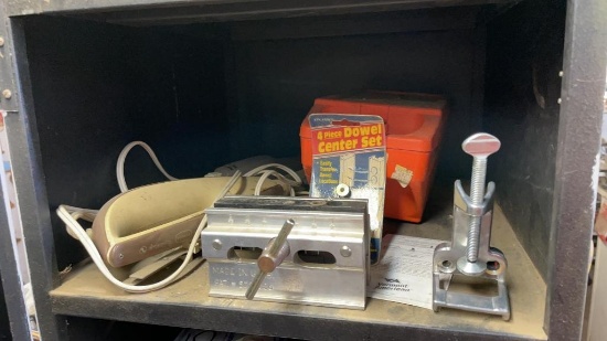 Metal locking storage box with remaining contents