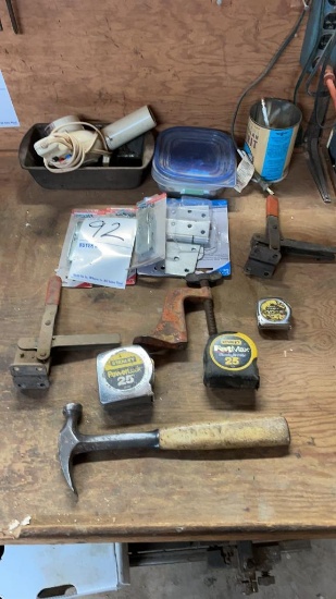 Contents of table (tape measures, hammers, etc