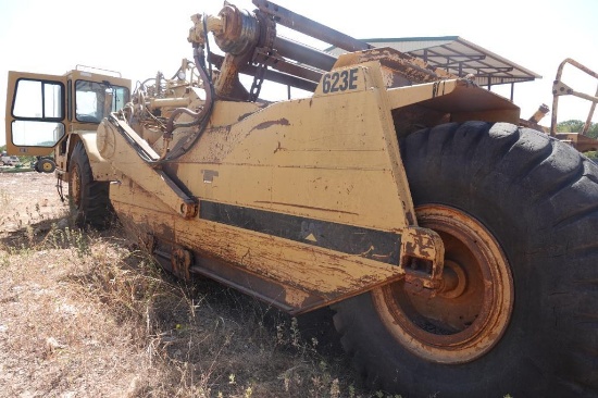 1993 623 E Scraper. Serial number 6YF0385. Needs tires. Currently not running,