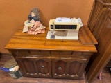 sewing machine and cabinet w/contents
