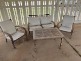 Patio Furniture with Bench, two chairs, and a table