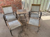 Two patio chairs, table, and two footstools