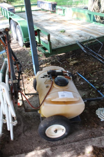 NorthStar tow-behind sprayer with boom arms