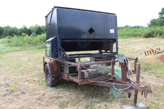 Cattle 3E digital counting feed bin mounted on single-axle trailer with winch and spare tire