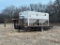 Feed or seed bin with auger