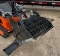 Skid steer rock bucket attachment