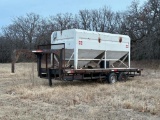 Feed or seed bin with auger