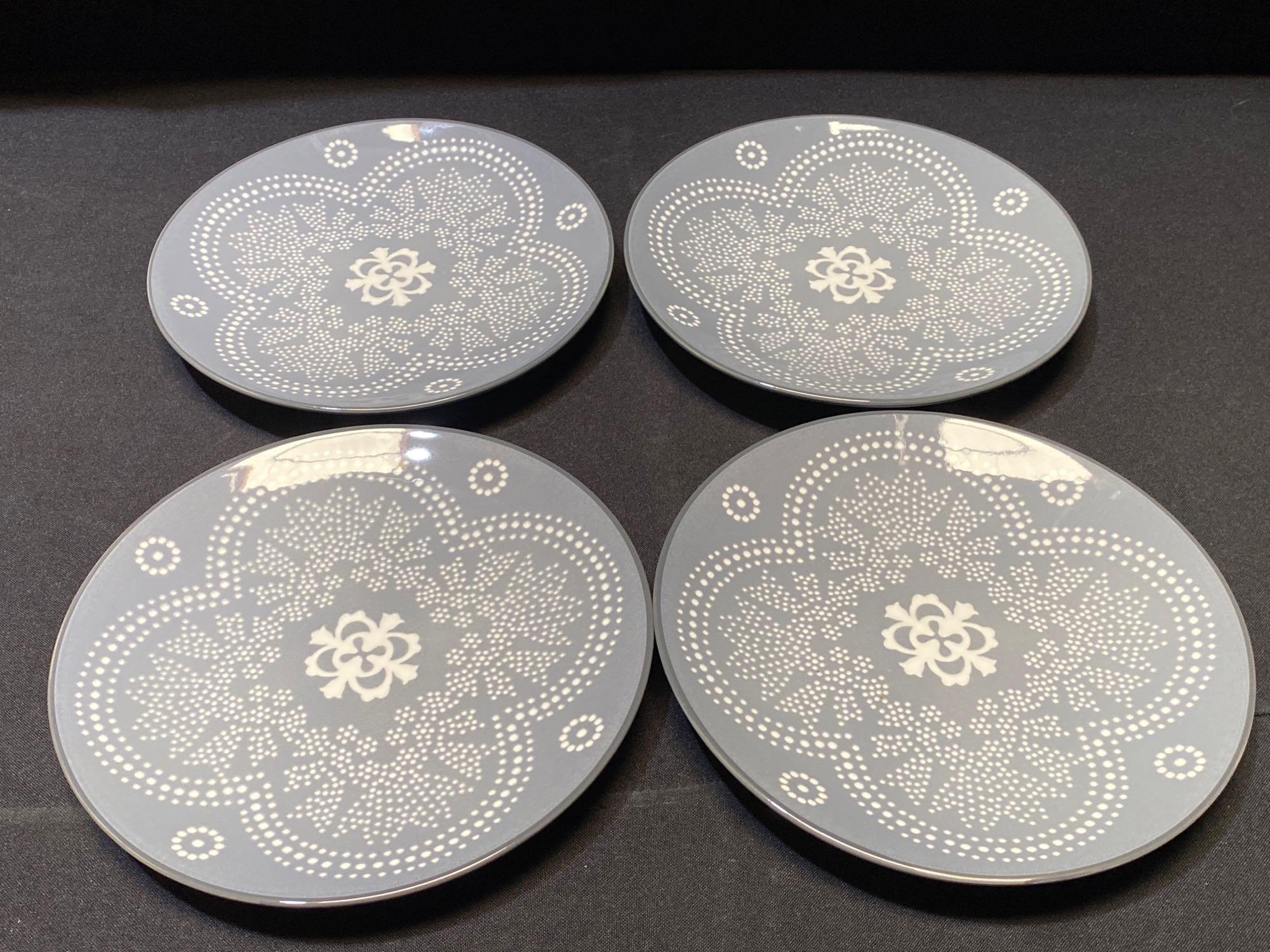 PHARA GREY 16 PIECE DINNERWARE SET (a plate has a Proxibid