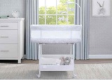 Delta Children SmartSleep Auto Glide Bassinet with Bluetooth