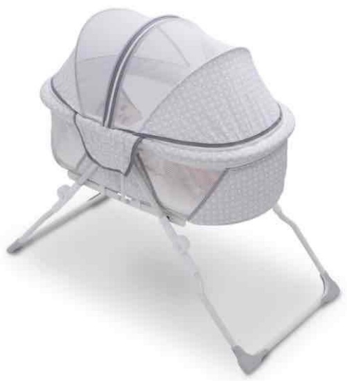 Delta Children Ultra Compact Travel Bassinet with Full Canopy