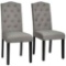 Chairs with tufted upholstery and nailhead trim
