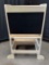 Chalkboard and transformable wooden table and bench for children