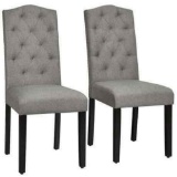 Chairs with tufted upholstery and nailhead trim
