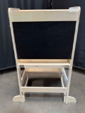 Chalkboard and transformable wooden table and bench for children
