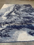 Icon area rug 5ft 3in x 7ft.