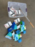Various items, Kids Floaties, Kitchen items and bin.