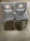 Qty 2 Cushioned Chairs with Writing on them.