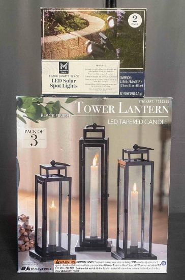 3 Pack of Tower Lantern LED Tapered Candle & 2 Pack Matte Black LED Solar Spot Lights