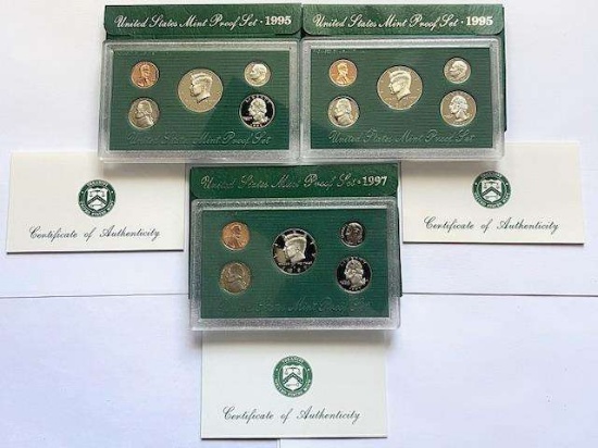 (2) 1995 United States Mint Proof Sets (1) 1997 United States Mint Proof Set (15-coins)