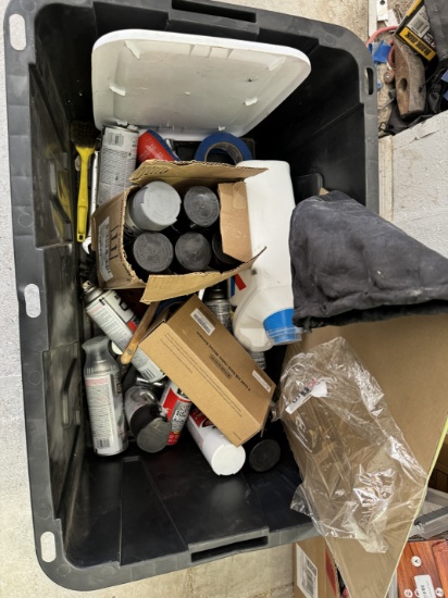 lot of aerosol paints and some work tools