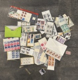 Lot of Assorted Postage Stamps – Collectible in Case