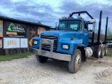 1999 MACK RD6885 DAYCAB TRACTOR WITH LOG BUNKS
