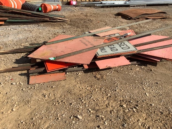 Stack of Misc. Road Construction Signs with Polls
