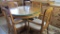 Wood Kitchen Table With Glass Top, Leaf, & (4) Arm Chairs - Zone: K